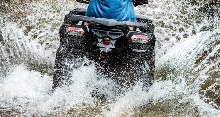 U.S. Army ATV navigating a river crossing